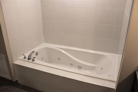 Suite, 1 King Bed with Sofa bed, Non Smoking (Whirlpool In Bath) | Deep soaking bathtub