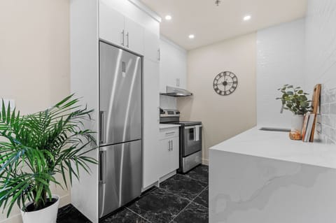 Grand Condo, 2 Bedrooms (105) | Private kitchen | Full-size fridge, microwave, oven, stovetop