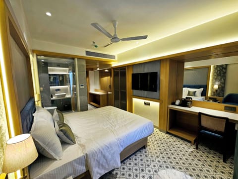 Premium Room, City View | Down comforters, desk, laptop workspace, blackout drapes