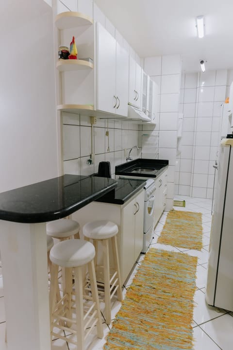 Family Apartment | Private kitchen | Cookware/dishes/utensils, dining tables