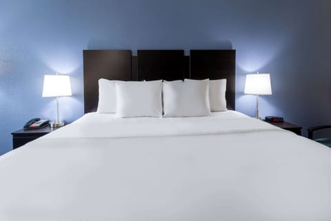 Premium bedding, pillowtop beds, desk, blackout drapes