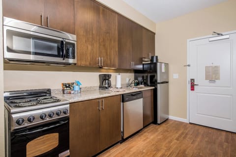 Studio, Multiple Beds | Private kitchen | Fridge, microwave, stovetop, dishwasher