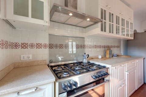 Apartment | Private kitchen | Full-size fridge, microwave, stovetop, electric kettle