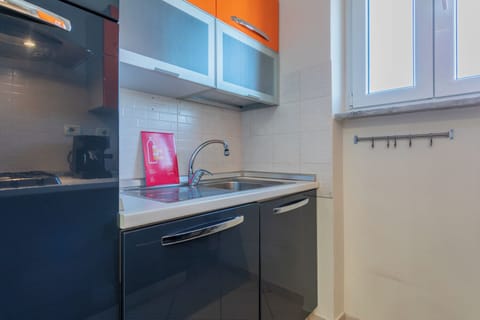 Apartment, Balcony, City View | Private kitchen | Full-size fridge, oven, stovetop, dishwasher