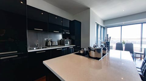 Penthouse, 3 Bedrooms | Private kitchen | Full-size fridge, microwave, dishwasher, coffee/tea maker