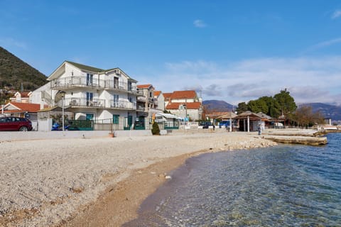 On the beach, white sand, 3 beach bars