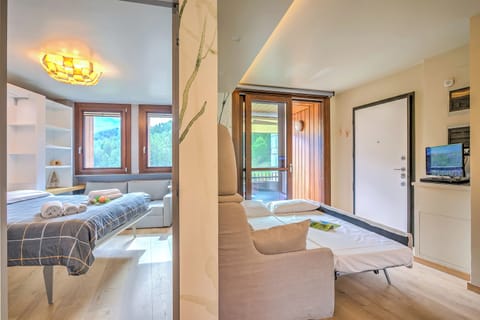 Luxury Apartment, 1 Bedroom (Il Mughetto Campo Smith On The Ski) | 1 bedroom, laptop workspace, WiFi, bed sheets