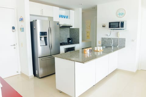 Apartment | Private kitchen | Full-size fridge, microwave, oven, stovetop