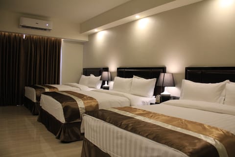 Family Triple Room, Multiple Beds, Bathtub, Poolside | Premium bedding, minibar, in-room safe, desk