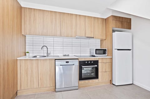 Apartment | Private kitchen | Full-size fridge, microwave, oven, stovetop