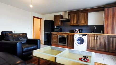 Apartment, Garden View | Private kitchen | Fridge, microwave, oven, cookware/dishes/utensils