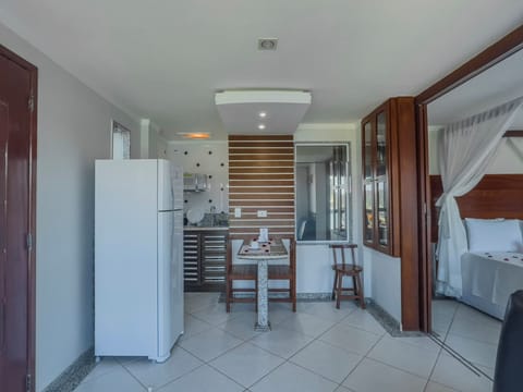 Deluxe Apartment, Sea View | Private kitchen | Microwave, coffee/tea maker, blender, cookware/dishes/utensils