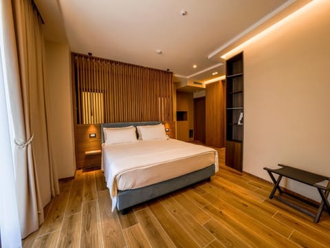 Junior Suite, City View | Premium bedding, down comforters, minibar, in-room safe