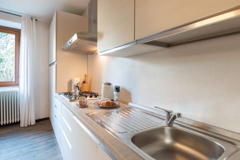 Apartment | Private kitchenette | Espresso maker, coffee/tea maker, dining tables