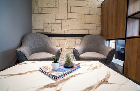 Standard Studio, Balcony | Living area | 145-cm Smart TV with satellite channels, heated floors