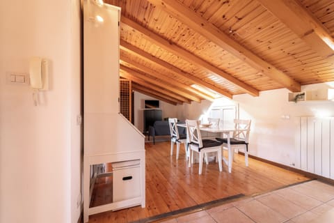 Apartment, Lake View | Living area | 32-inch TV with digital channels