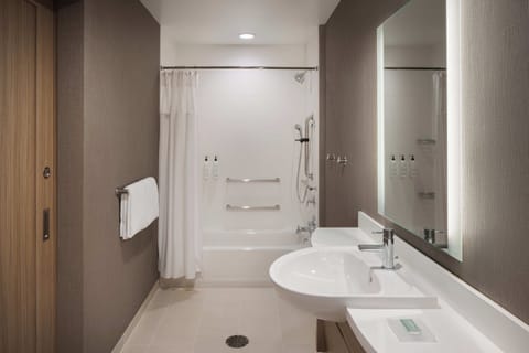 Suite, Multiple Beds | Bathroom | Shower, hair dryer, towels, toilet paper