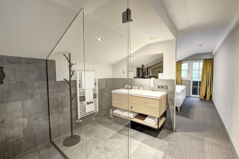 Free toiletries, hair dryer, bathrobes, slippers