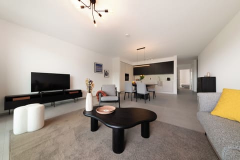 Comfort Apartment | Living area | Flat-screen TV, heated floors