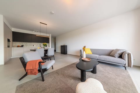 Comfort Apartment | Living area | Flat-screen TV, heated floors