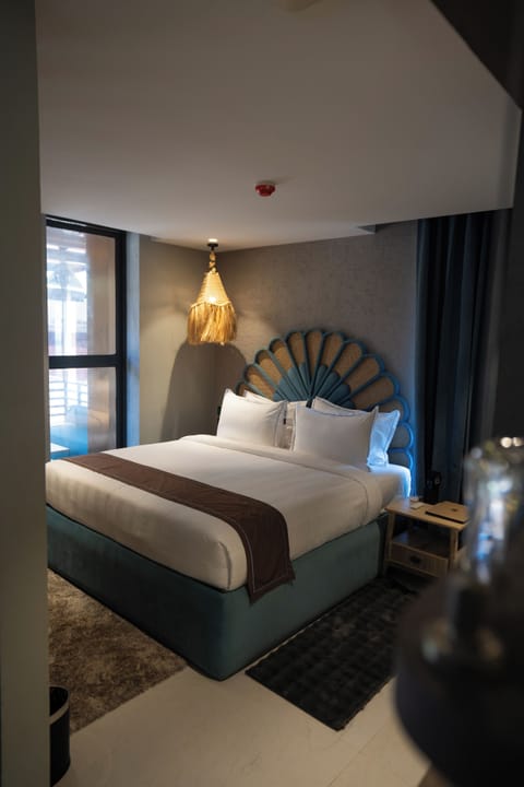 Junior Suite, Terrace | Minibar, iron/ironing board, bed sheets