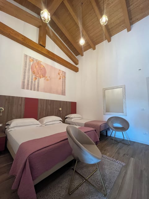 Junior Room, Garden View | Down comforters, minibar, in-room safe, desk