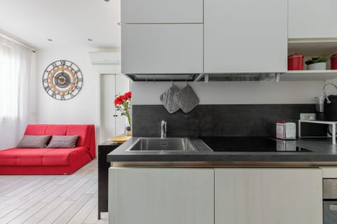 Apartment | Living area | 32-inch flat-screen TV with cable channels