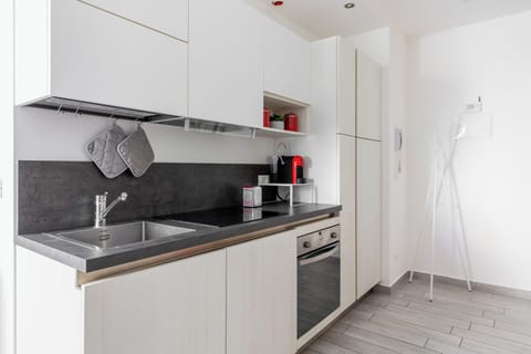 Apartment | Private kitchen | Fridge, oven, stovetop, espresso maker