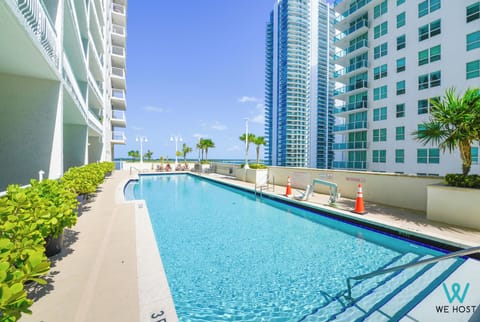 Outdoor pool, pool umbrellas, sun loungers