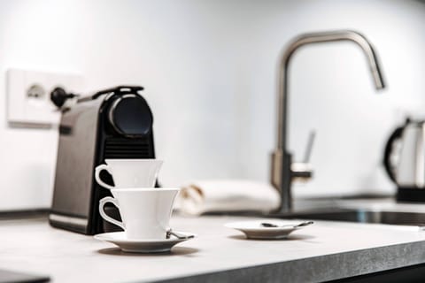 4 bedrooms, premium bedding, down comforters, iron/ironing board