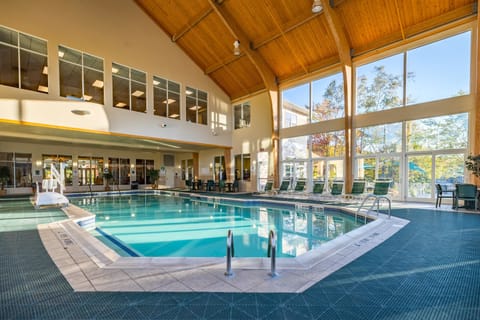 Indoor pool, outdoor pool, pool umbrellas