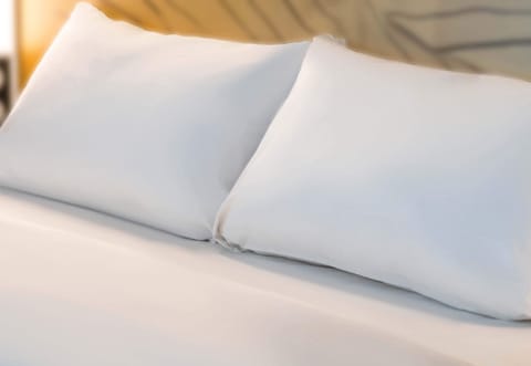 Premium bedding, in-room safe, individually decorated