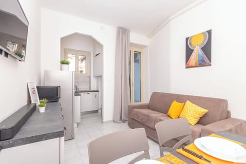 Apartment, Balcony | Living area | 35-inch TV with digital channels