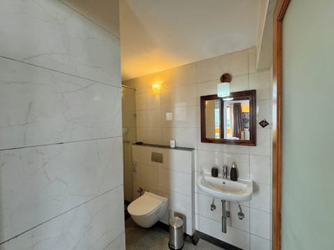 Penthouse, Beach View | Bathroom | Shower, rainfall showerhead, free toiletries, towels