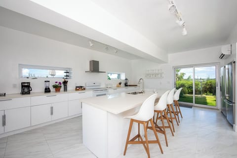 Villa | Private kitchen | Full-size fridge, microwave, oven, stovetop