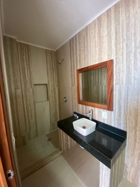 Basic Suite, Balcony | Bathroom | Shower, towels, toilet paper