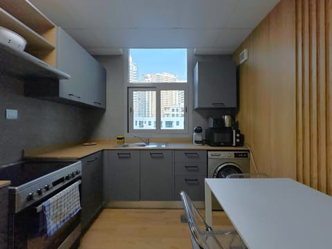 Luxury Studio, City View | Private kitchen | Full-size fridge, microwave, oven, stovetop