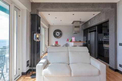 Apartment, Balcony, Sea View | Living area | 35-inch TV with digital channels