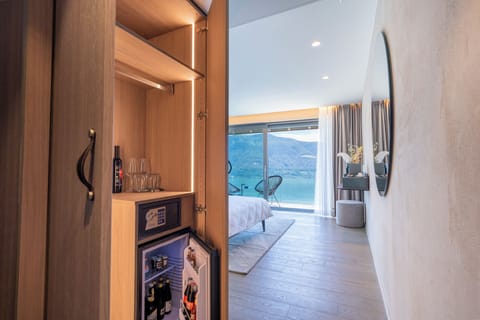 Deluxe Room, Private Bathroom, Lake View | Minibar, individually decorated, desk, free WiFi