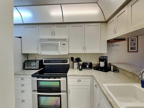 Condo, Multiple Beds, Patio, Garden View (Bouchelle Island 101) | Private kitchen | Coffee/tea maker