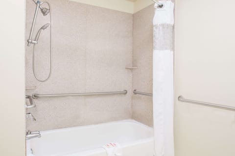 Combined shower/tub, designer toiletries, hair dryer, towels