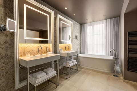 Presidential Suite, 1 King Bed | Bathroom | Rainfall showerhead, hair dryer, bathrobes, slippers