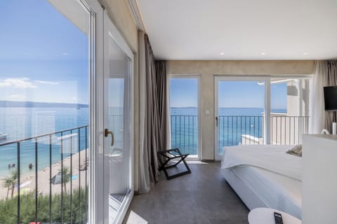 Suite, 2 Bedrooms, Sea View | Minibar, in-room safe, blackout drapes, soundproofing