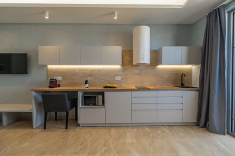 Deluxe Room, Courtyard View | Private kitchen | Shared fridge, microwave, electric kettle