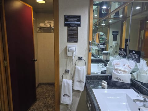 Hair dryer, slippers, towels, soap