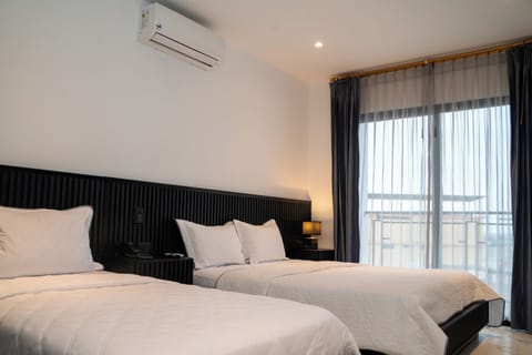 Comfort Twin Room, Ocean View | Blackout drapes, soundproofing, iron/ironing board, free WiFi