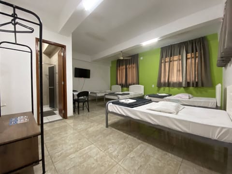 Room, Multiple Beds, Private Bathroom | Desk, laptop workspace, free WiFi