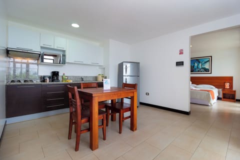 Deluxe Apartment, Private Bathroom, Sea View | Private kitchen | Full-size fridge, microwave, coffee/tea maker, electric kettle