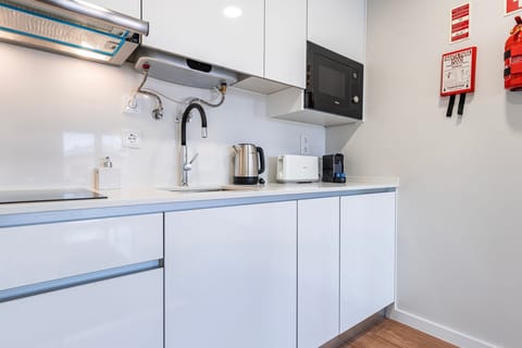 Family Studio, Balcony | Private kitchenette | Fridge, microwave, stovetop, espresso maker