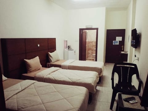 Economy Triple Room | Free WiFi, bed sheets